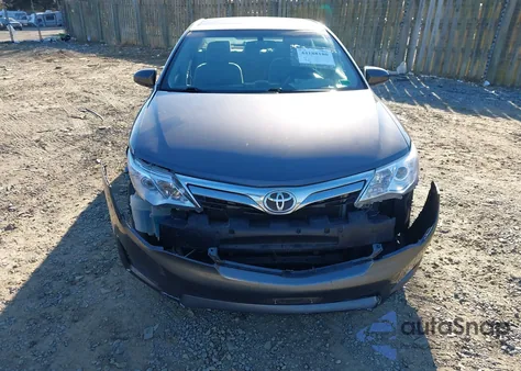 2014 Toyota Camry Le z USA, uszkodzony, nr VIN 4T4BF1FK0ER350557